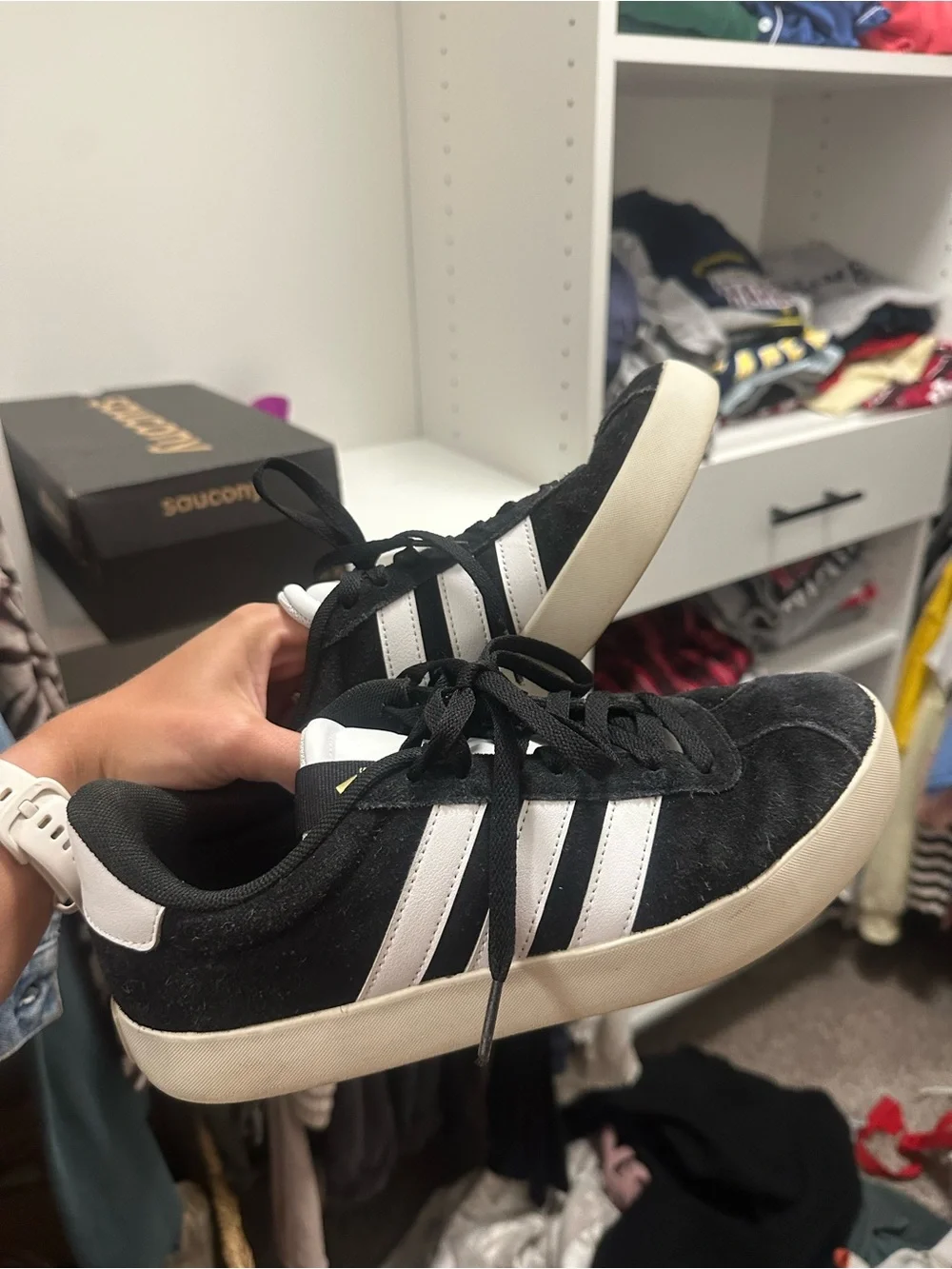 Women’s black adidas sneakers